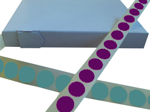 Two strips of Gammatex Ethylene Oxide (ETO) Chemical Sterilisation Indicator Labels. One strip has Purple dots (unsterilised / unexposed) and one strip has turquoise dots (sterilised / exposed)