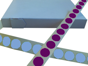 Two strips of Gammatex Ethylene Oxide (ETO) Chemical Sterilisation Indicator Labels. One strip has Purple dots (unsterilised / unexposed) and one strip has light blue dots (sterilised / exposed)